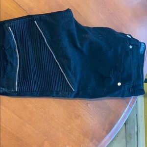 Black ripped jeans with rippers